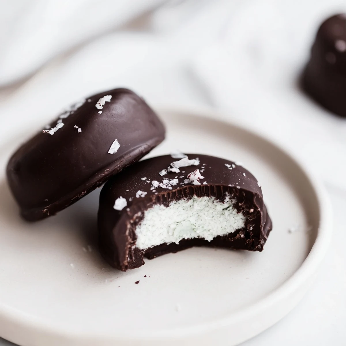Homemade Peppermint Patties chilled on parchment, perfect for gifting or after-dinner treats  